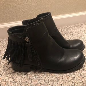 Fringe black ankle boots.